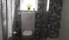 Grande douche à l'italienne en 120 , WC suspendu (papier toilette fourni), lave linge en cours d'installation